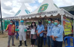 Dukung Pemkab Perangi COVID-19 – PT GAM Bantu 17.000 Masker dan APD di Sangkulirang