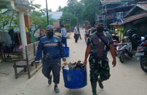 Kodim 0909 Kutim Gandeng PWI-SMSI Bersih-Bersih Kawasan Lingkar Sungai Masabang